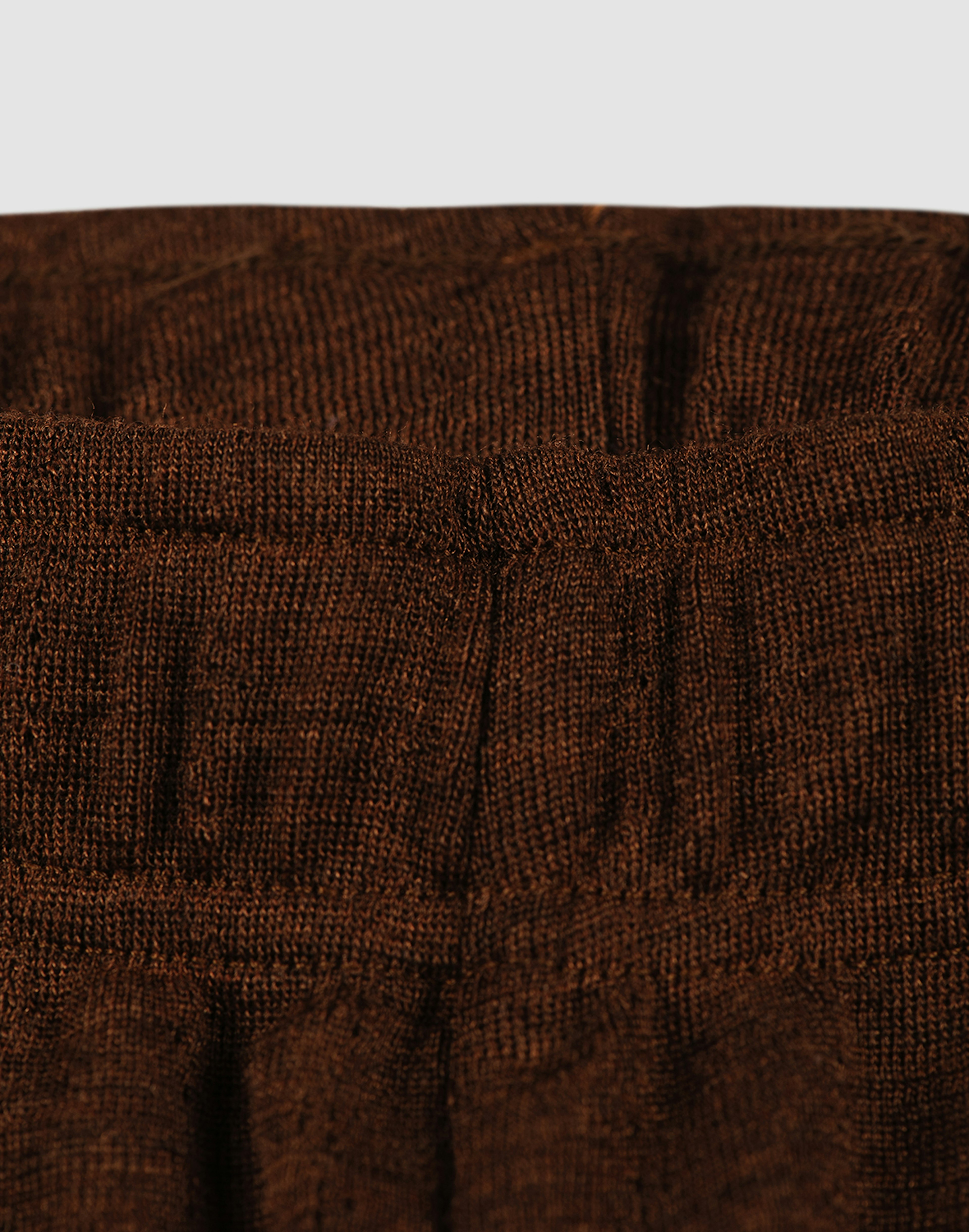 Bukser med hulmønster i merinould/silke til børn